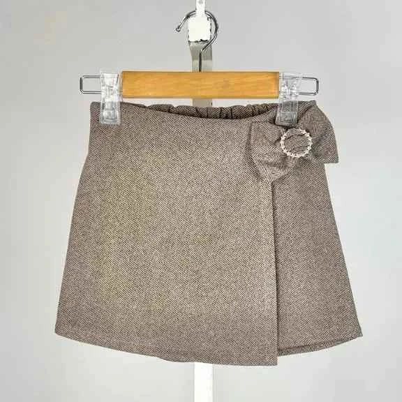 Jupe-short à chevrons et nœud