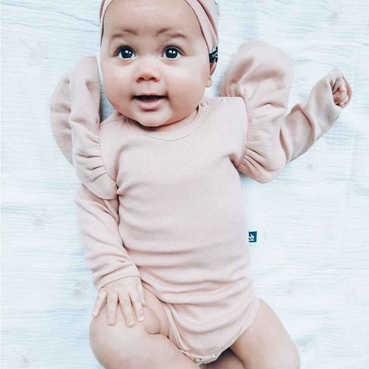 Barboteuse à volants côtelé