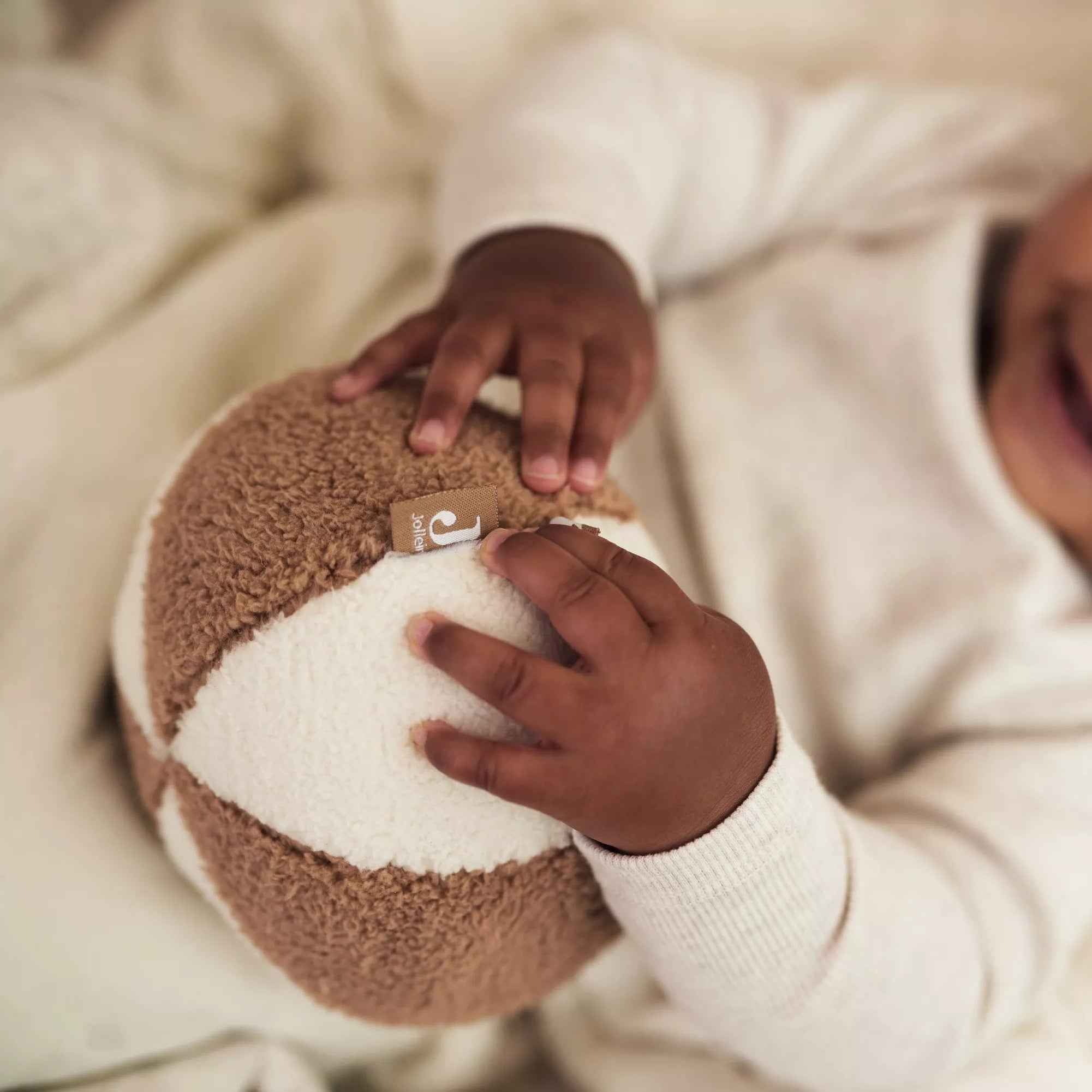 Balle d'éveil ivoire/biscuit