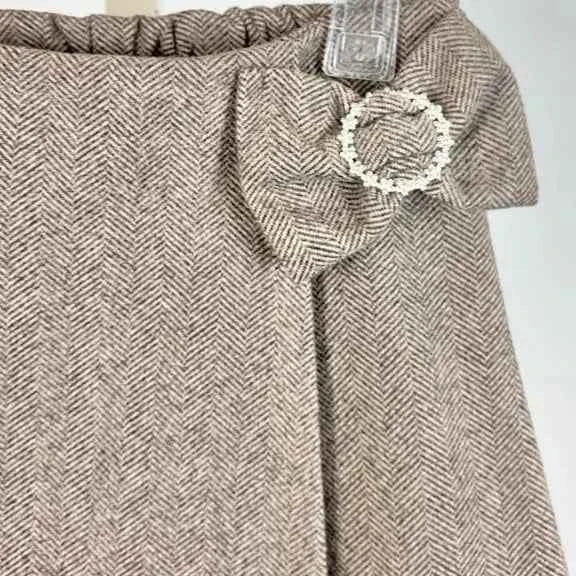 Jupe-short à chevrons et nœud